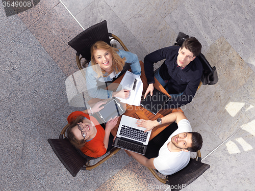 Image of students group working on school  project  together