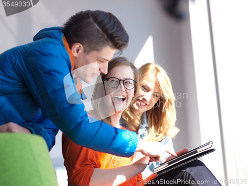 Image of students group working on school  project  together
