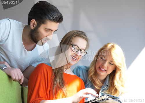 Image of students group working on school  project  together