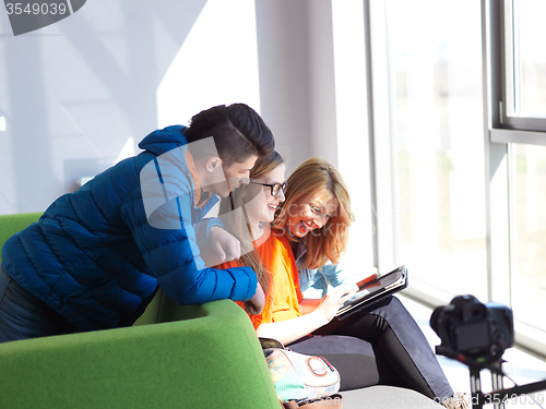 Image of students group working on school  project  together