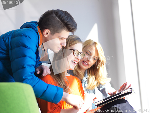 Image of students group working on school  project  together