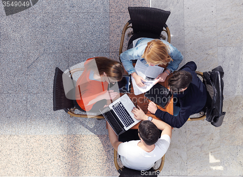 Image of students group working on school  project  together