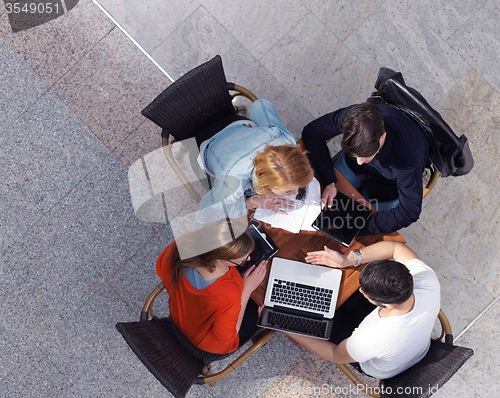 Image of students group working on school  project  together