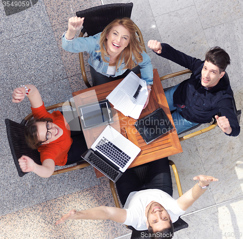 Image of students group working on school  project  together
