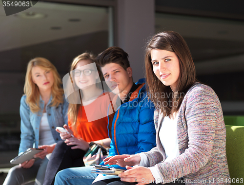 Image of students group working on school  project  together