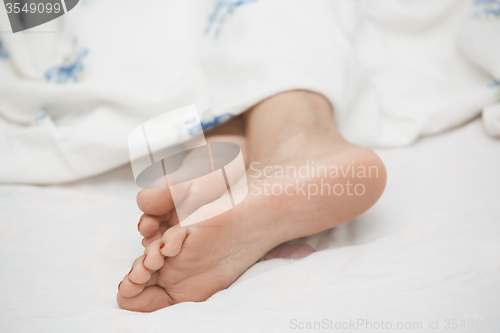 Image of Feet of sleeping woman