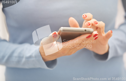 Image of Woman using smartphone