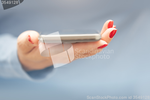 Image of Woman with smartphone