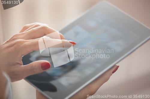 Image of Woman with tablet computer