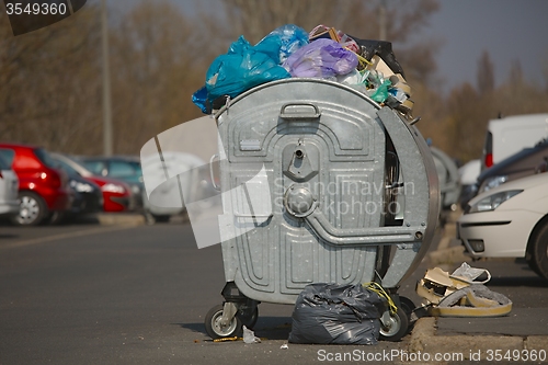 Image of Garbage Containers Full, Overflowing