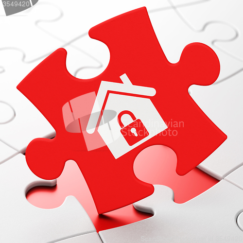 Image of Finance concept: Home on puzzle background