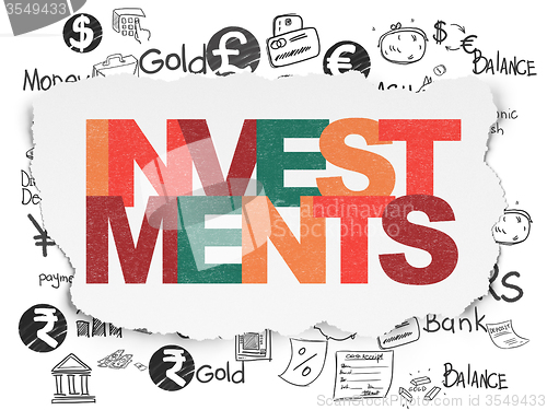 Image of Money concept: Investments on Torn Paper background