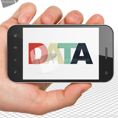 Image of Data concept: Hand Holding Smartphone with Data on  display