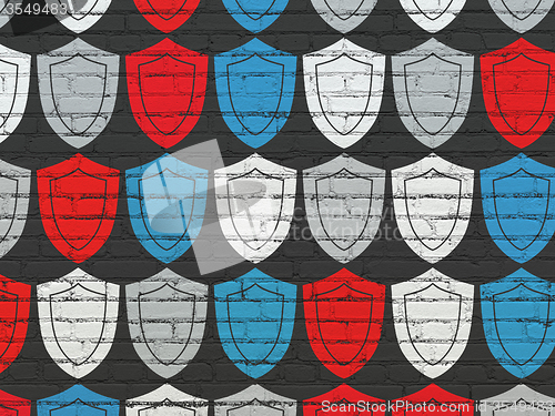 Image of Security concept: Shield icons on wall background