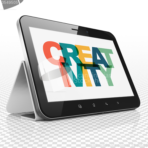 Image of Marketing concept: Tablet Computer with Creativity on  display