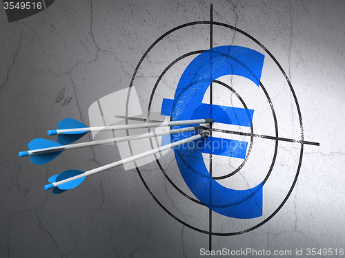 Image of Currency concept: arrows in Euro target on wall background