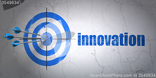 Image of Business concept: target and Innovation on wall background