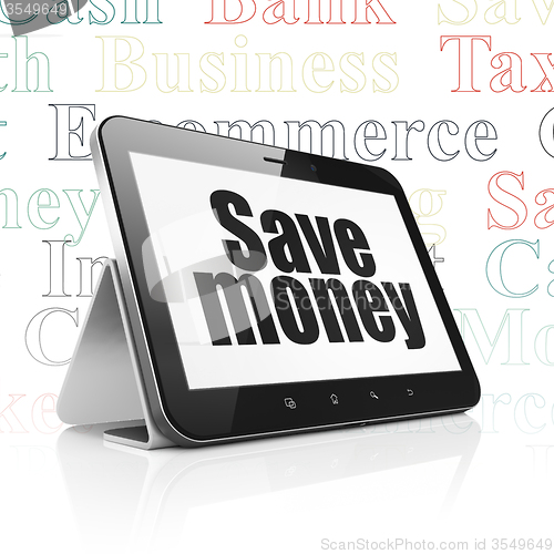 Image of Currency concept: Tablet Computer with Save Money on display