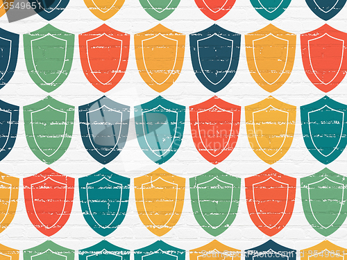 Image of Safety concept: Shield icons on wall background
