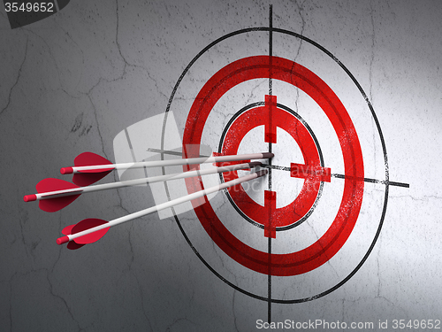 Image of Finance concept: arrows in Target target on wall background