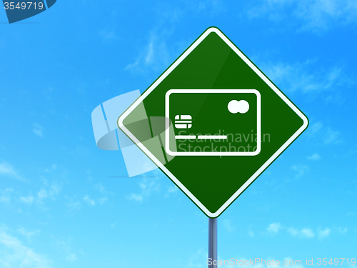 Image of Currency concept: Credit Card on road sign background