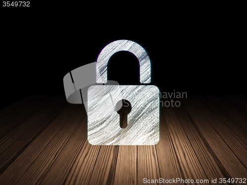 Image of Data concept: Closed Padlock in grunge dark room