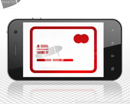 Image of Finance concept: Smartphone with Credit Card on display