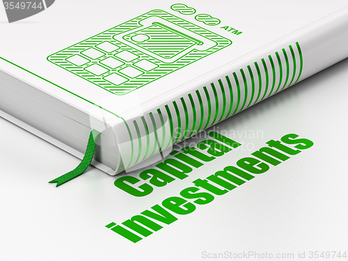 Image of Currency concept: book ATM Machine, Capital Investments on white background