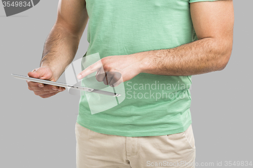Image of Man working with a tablet, 