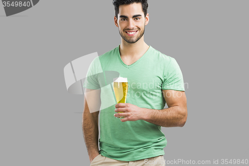 Image of Young man drinking beer