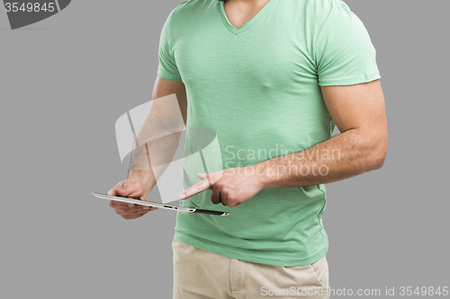 Image of Man working with a tablet, 