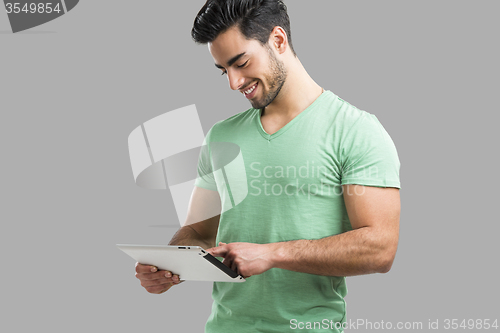 Image of Man working with a tablet, 