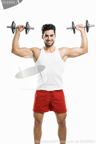 Image of Athletic man lifting weights