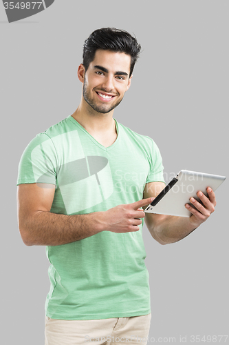 Image of Man working with a tablet, 