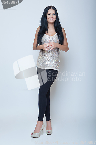 Image of attractive brunette young slim girl fashion style long leg and h
