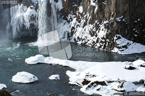 Image of Closeup of frozen waterfall Godafoss, Iceland