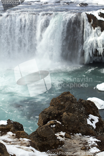 Image of Closeup of frozen waterfall Godafoss, Iceland