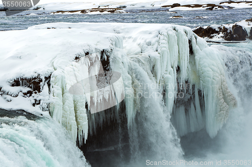 Image of Closeup of frozen waterfall Godafoss, Iceland