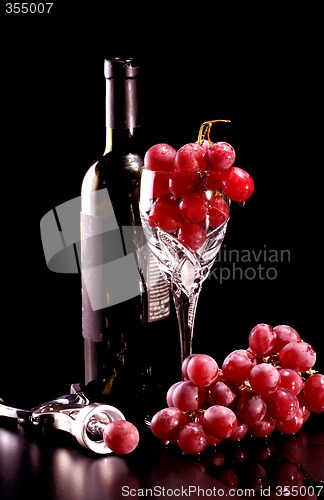 Image of elegant wine bottle setting