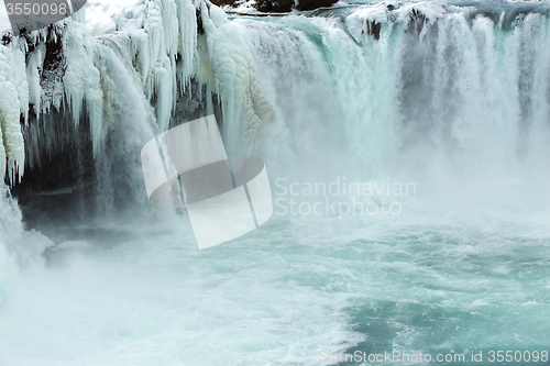 Image of Closeup of frozen waterfall Godafoss, Iceland