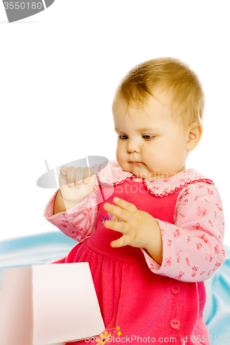 Image of baby girl in a dress