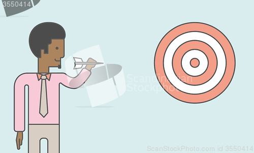 Image of Businessman with target board.