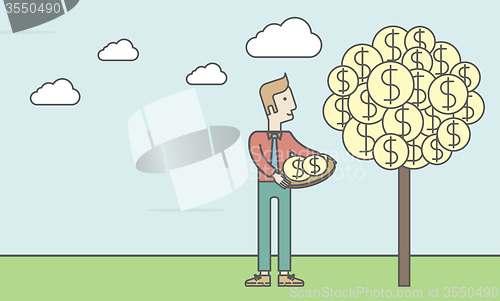 Image of Man catching dollar coins.