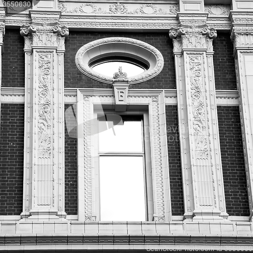 Image of old window in europe london  red brick wall and      historical 