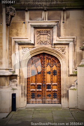 Image of parliament in london old church door and marble antique  wall
