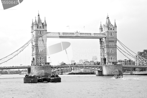 Image of london tower in england old bridge and the cloudy sky