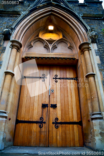 Image of wooden parliament in london   and marble antique  wall