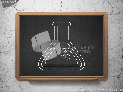 Image of Science concept: Flask on chalkboard background