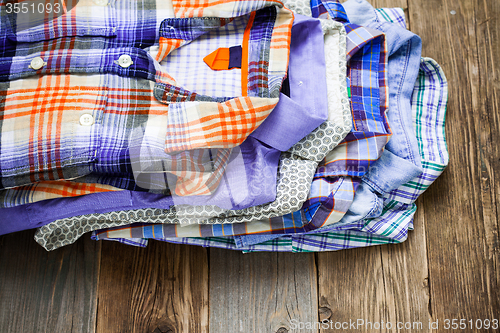 Image of shirts in a pile