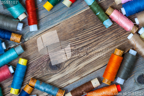 Image of Vintage spools with multi colored threads